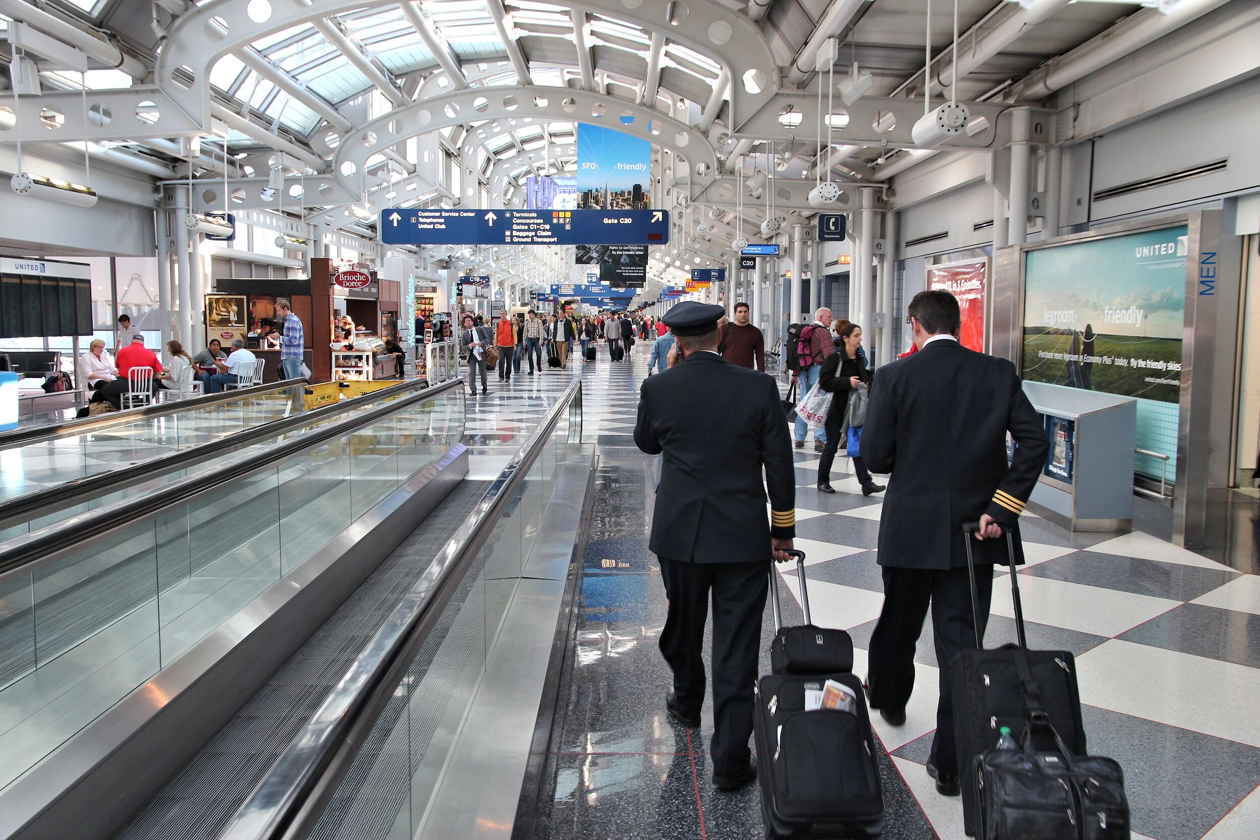 Pilots walk to gate at Chicago O'Hare International Airport in USA